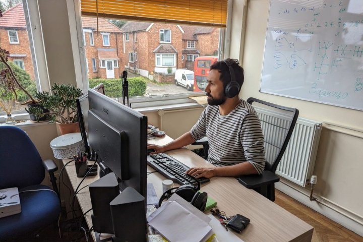 Our technician coding a web project in the Wiseserve Oxford office